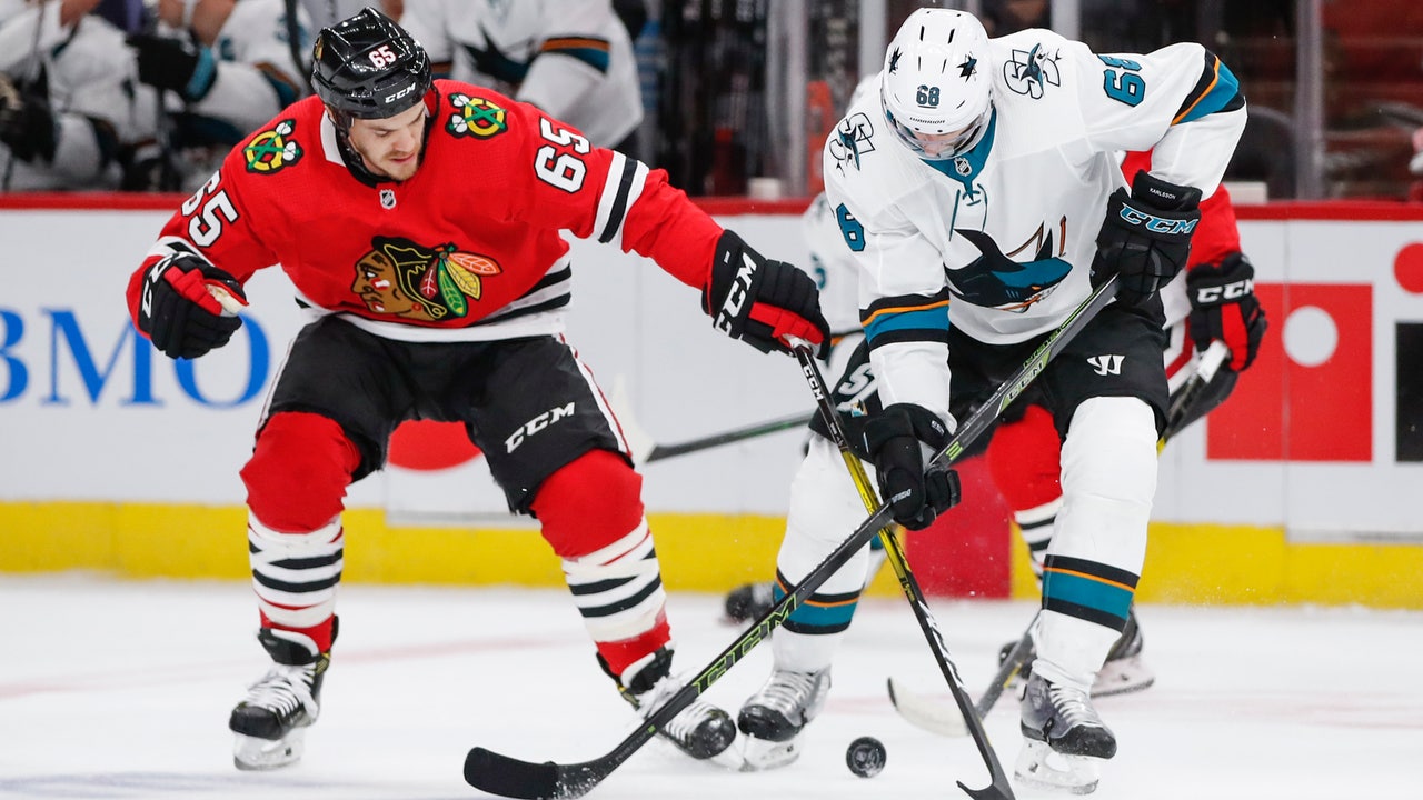Marleau helps Sharks beat Blackhawks 5-4 for 1st win